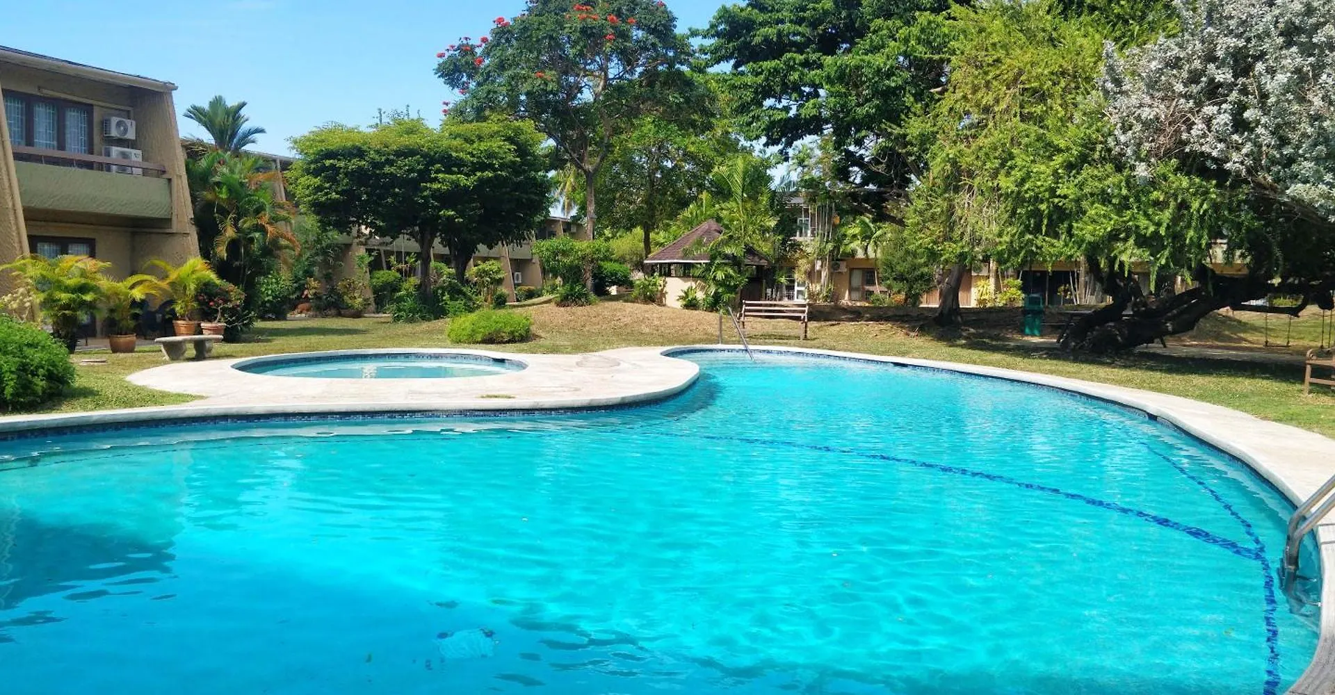1Br, 24Hr Security - City Charm With Poolside Peace Port of Spain